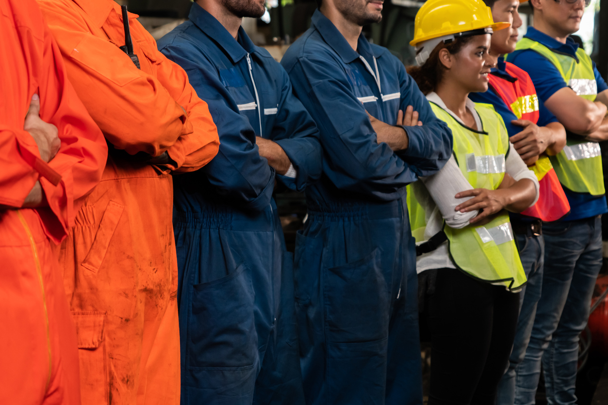 Factory workers standing in line