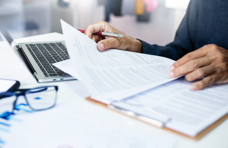 Man filing paperwork